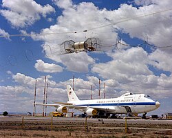 A right front view of a USAF Boeing E-4 advanced airborne command post (AABNCP) on the electromagnetic pulse (EMP) simulator (HAGII-C) for testing