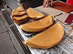 Apam balik (turnover/upside down pancake)[34][35] can be found throughout Malaysia street market, part of the country street food culture[36]