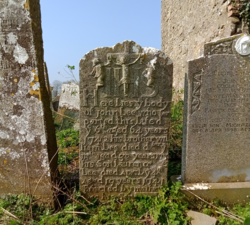 Gravestone in Coolaghmore, County Kilkenny of the Lee family, of whom three members died in 1741–42, aged 19, 30 and 64. The fact that they could afford a carved headstone makes it unlikely that they died of hunger, but the disease epidemics triggered by the famine may have caused the deaths of some or all of them.