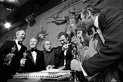 Hackman (4th from the left) while celebrating the Academy Awards with cast members of The Poseidon Adventure in 1972