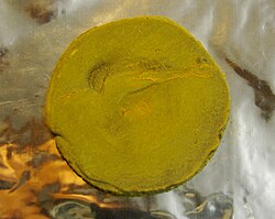 Oxidized europium, coated with yellow europium(II) carbonate