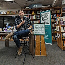 Author Jared Yates Sexton giving a talk at Politics and Prose as part of his book tour