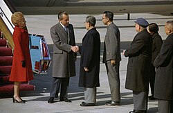 US President Richard Nixon shakes hands with Chinese Premier Zhou Enlai at Beijing Capital International Airport