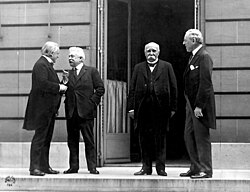 The "Big Four" at the Paris Peace Conference on May 27, 1919, following the end of World War I with Wilson standing next to Georges Clemenceau on the right
