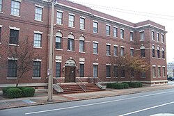 A three-story, red brick building in Arkansas. The Rose Law Firm is located inside this building. Clinton worked at Rose Law Firm for fifteen years.