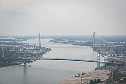 Ambassador Bridge with the Gordie Howe International Bridge in the background in June 2025