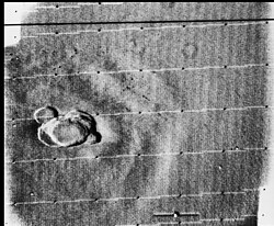 Mariner 9 image of Ascraeus Mons.[1] This is one of the first images to show that Mars has large volcanoes.