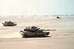 M1 Abrams tanks moving out before the Battle of Al Busayyah during the Gulf War