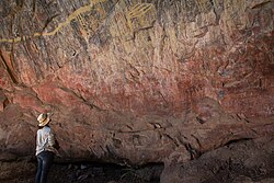 Graffitied rock art in Nsalu Cave, Kasanka National Park in North-Central Zambia