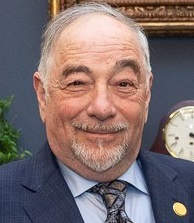 KSFO's The Savage Nation, hosted by Michael Savage (pictured in 2018), became a full nationally syndicated show in 2000.