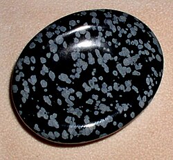 Polished snowflake obsidian, formed through the inclusion of cristobalite crystals