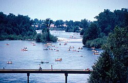 The American River is popular for kayaking and recreational boating.