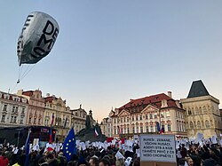 Pro-EU Czechs protest in Prague against politicians accused of pro-Russian sympathies, 17 November 2018. The sign reads: "...all Russians...go away from the Czech Republic or die!"