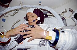 Sullivan dons her space suit in case an EVA was required to support the Hubble Space Telescope deployment on STS-31.