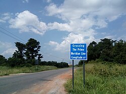 Prime meridian sign near Somanya, Ghana