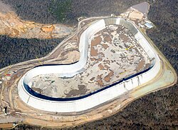Aerial photo of reconstruction at Taum Sauk (Missouri) pumped storage facility in late November 2009. After the original reservoir failed, the new reservoir was made of roller-compacted concrete.