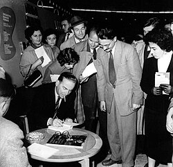 Andrić signing books at the Belgrade Book Fair