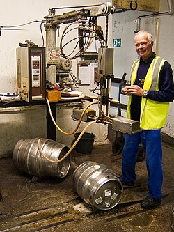 Adding finings to a cask of beer