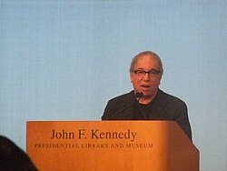 Simon paying tribute to musicians Leonard Cohen and Chuck Berry, the recipients of the first annual PEN Awards for songwriting excellence, at the John F. Kennedy Presidential Library and Museum on February 26, 2012