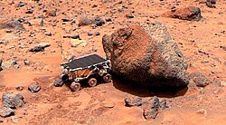 Sojourner takes its Alpha particle X-ray spectrometer measurement of Yogi Rock on Mars.