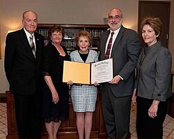 Reagan receiving an honorary degree from Eureka College, 2009