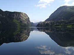 Haukalivatnet lake (50 meters—164 feet—above sea level) where Jens Esmark in 1823 discovered similarities to moraines near existing glaciers in the high mountains