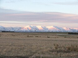 The Kakanui Range dominates the eastern horizon of the Maniototo Plain of New Zealand.