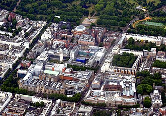Aerial view of Albertopolis. The Albert Memorial, Royal Albert Hall, Royal Geographical Society, and Royal College of Art are near the top; V&A and Natural History Museum at the lower end; Imperial, Royal College of Music, and Science Museum in between.
