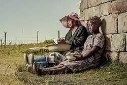 Women preparing peaches in Lesotho, Africa