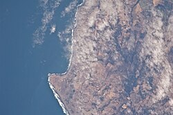 Aerial view of Pichilemu. The urban area is located at the top, while Punta de Lobos can be seen at the bottom.