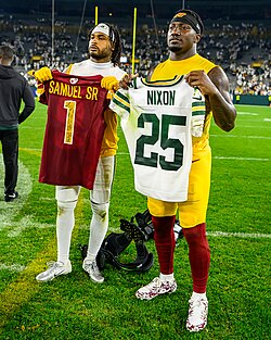 Nixon swapping jerseys with Washington Commanders wide receiver, Deebo Samuel, in 2025