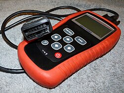 "MaxScan OE509" – a fairly typical onboard diagnostics (OBD) scanner, 2015.