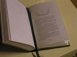 A book with a bound bookmark.