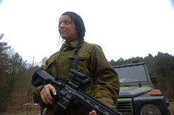 Norwegian woman soldier. Norway became, in 2015, the first NATO member to have a legally compulsory national service for both men and women, and the first country in the world to draft women on the same formal terms as men.