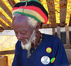 A Rasta man wearing symbols of his religious identity in Barbados