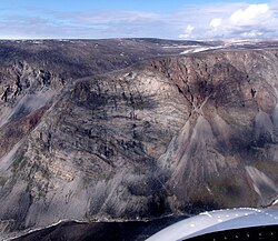 Aerial view of Proterozoic banded migmatite, deep fiord near Pond Inlet, Baffin Island, Nunavut.