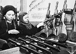 Two teenage girls assemble PPD-40 submachine guns during the Siege of Leningrad in 1942.
