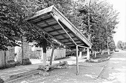 Neglected bus shelter needing repair