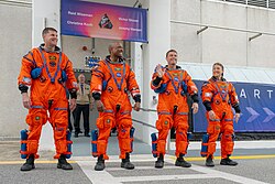 The crew of Artemis II walk out of the Operations and Checkout Building, just before boarding the spacecraft on April 1, 2026.