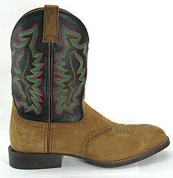 A roper-style cowboy boot has a low, squared-off heel