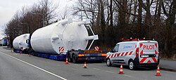 The Polish transport company Bedmet uses a special vehicle to transport two large silos.