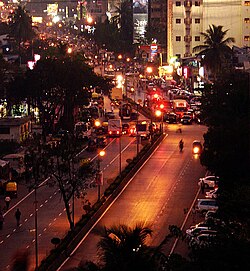 A city street in Mumbai, India with left-hand traffic