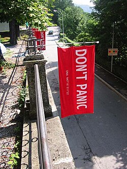 Towel Day 2005 in Innsbruck, Austria; In the Hitchhiker's Guide novels, a towel is the most useful thing a space traveller can have. The first annual Towel Day was celebrated on 25 May 2001, two weeks after Adams's death.[241]