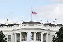 The flag at half-staff on the White House.