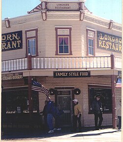 The Longhorn Restaurant is located where the Huachuca Water Company and the Meyers Brothers clothing store stood. The original building burned in 1942. Virgil Earp was shot from the second floor.[33]