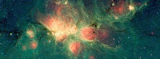 The Cat's Paw Nebula is inside the Milky Way Galaxy, in the constellation Scorpius.Green areas show regions where radiation from hot stars collided with large molecules and small dust grains called "polycyclic aromatic hydrocarbons" (PAHs), causing them to fluoresce. Spitzer Space Telescope, 2018.