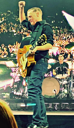 Adams performing in 2022