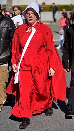 A member of the political action group The Handmaid Coalition