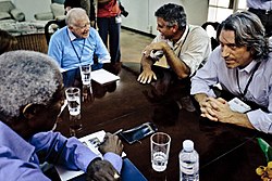 Prendergast in South Sudan during the Southern Sudanese independence referendum, 2011, with Kofi Annan, Jimmy Carter, and George Clooney