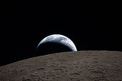 Koch took the photograph Earthset during the lunar flyby of Artemis II